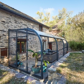 Abri de terrasse Panoramik à panneaux relevables