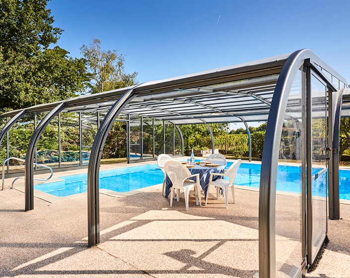 Abri de piscine Elliptik Haut à panneaux relevables