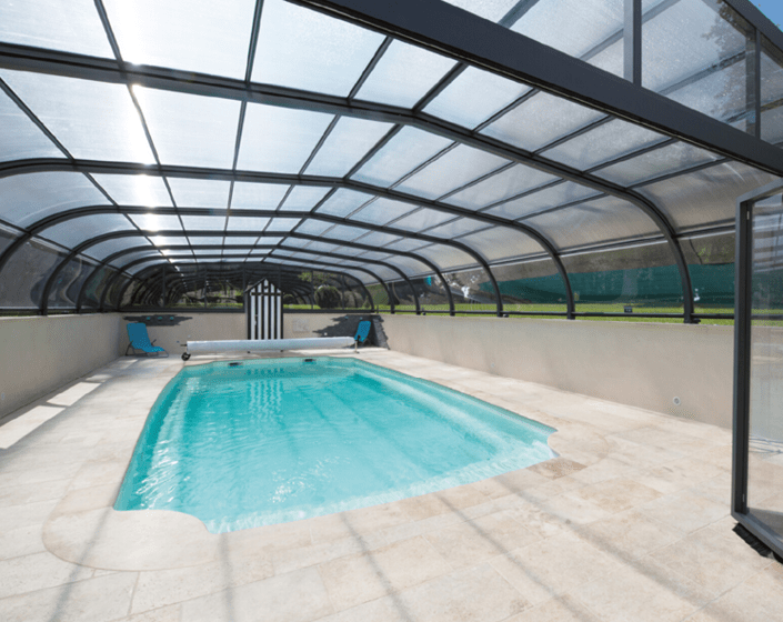 Abri de piscine Elliptik Haut à panneaux relevables