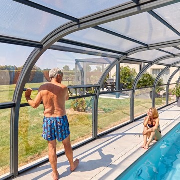 Abri de piscine Elliptik Haut à panneaux relevables