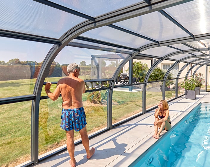 Abri de piscine Elliptik Haut à panneaux relevables