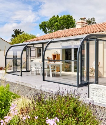 Abri de terrasse Panoramik à panneaux relevables