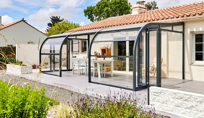 Abri de terrasse Panoramik à panneaux relevables