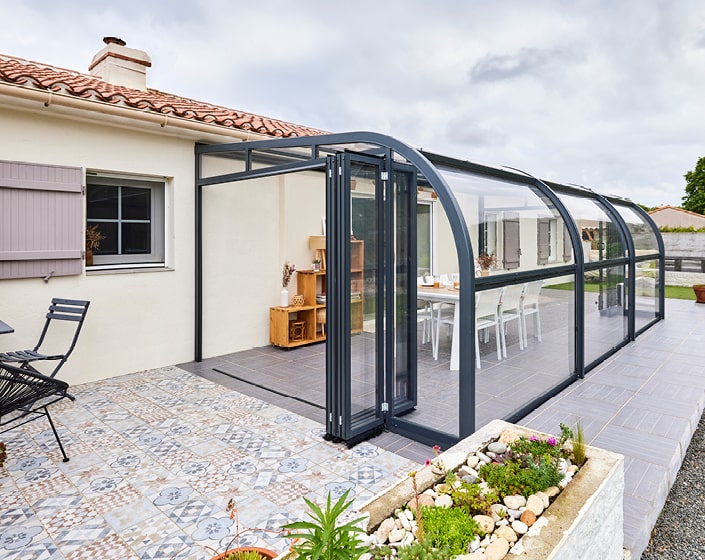 Abri de terrasse Panoramik à panneaux relevables