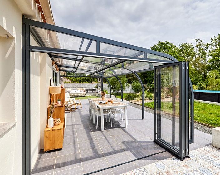 Abri de terrasse Panoramik à panneaux relevables