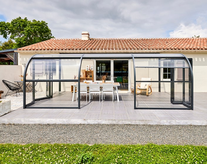 Abri de terrasse Panoramik à panneaux relevables