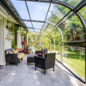 Abri de terrasse Panoramik à panneaux relevables